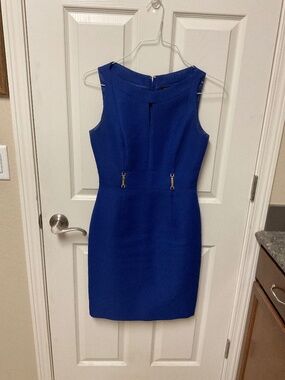 Royal blue sleeveless dress by Arthur Levine for Tahari.  Waistline detail